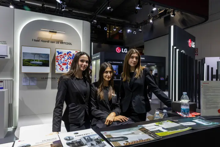 LG reception counter with ARTCOOL gallery wall and product brochures at MCE 2026