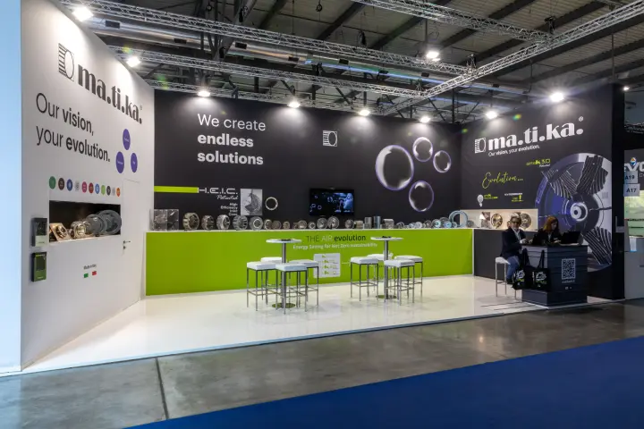 Ma.ti.ka stand with centrifugal impellers along a lime-green counter wall at MCE 2026