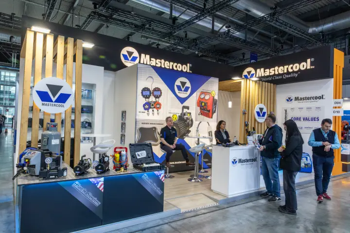 Mastercool stand with refrigerant recovery units, vacuum pumps and gauges at MCE 2026