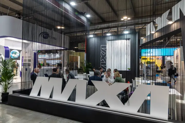 Maxa meeting area behind string curtains and freestanding logo letters at MCE 2026