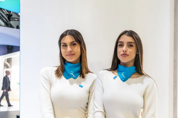 Midea staff in branded scarves at the stand at MCE 2026