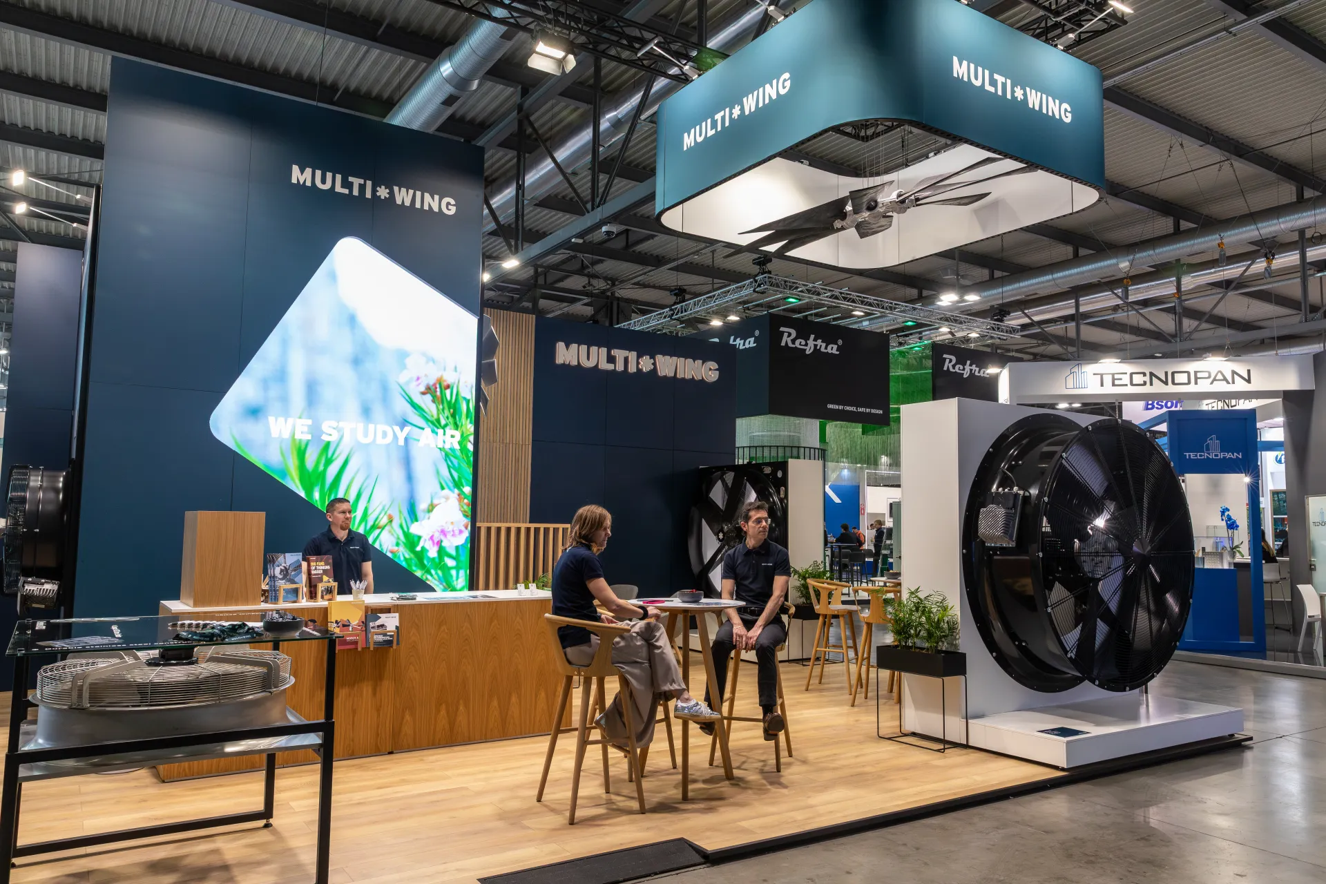 Multi-Wing stand with suspended fan frame and 'We Study Air' screen at MCE 2026