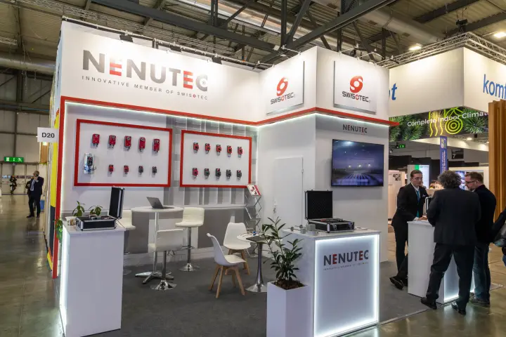Nenutec stand with red-framed wall panels of damper actuators