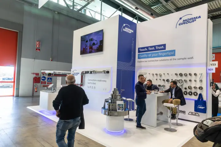 Norma Group sample wall of pipe clamps and connectors at MCE 2026