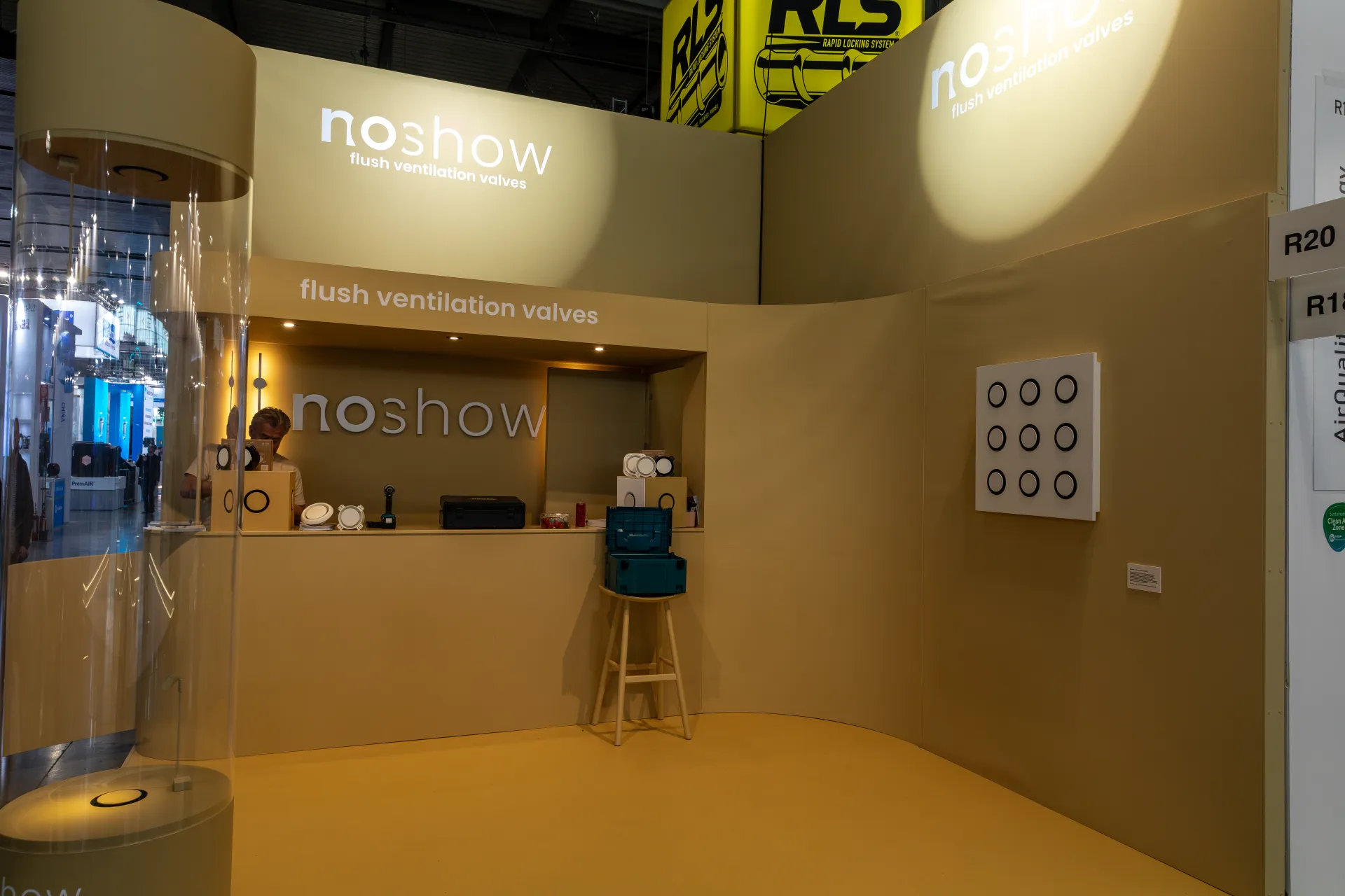 Noshow stand in ochre tones with flush ventilation valve wall display at MCE 2026
