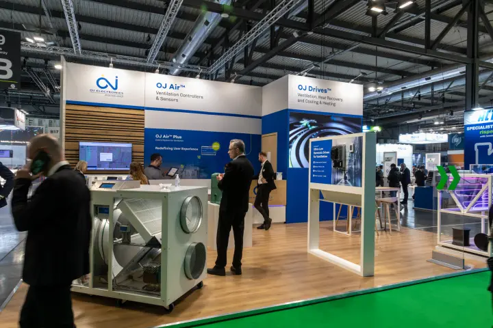 OJ Electronics stand with an open heat recovery unit and OJ Drives display at MCE 2026