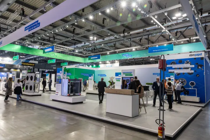 Open ebm-papst stand with hanging signs for each solution area at MCE 2026