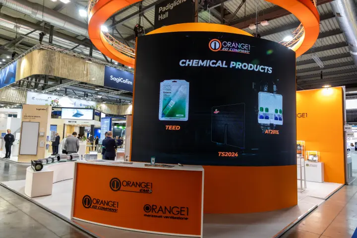 Orange1 ED Company stand promoting chemical products for HVAC-R