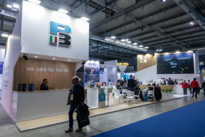 P3 stand with 'we care for the air' wood wall and visitor lounge