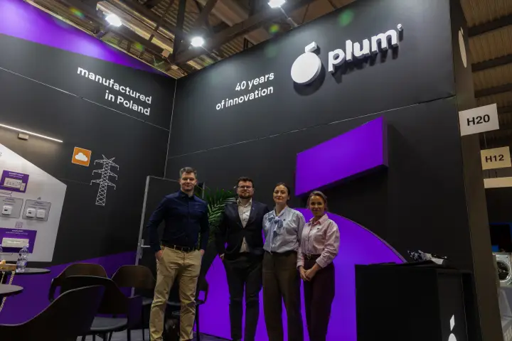Plum team at the stand under the '40 years of innovation' slogan
