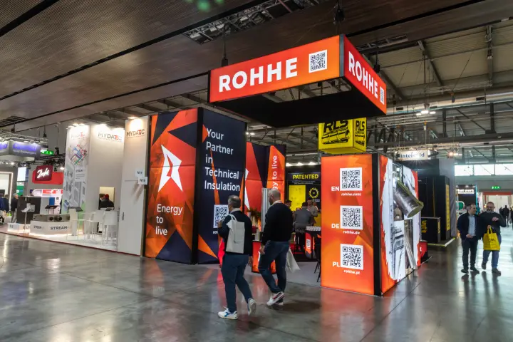 Rohhe technical insulation stand with suspended orange banner at MCE 2026