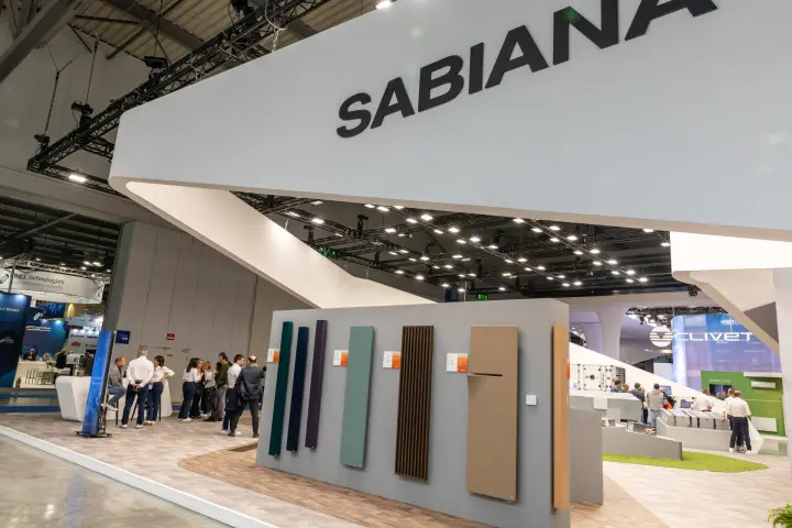 Sabiana canopy above a wall of coloured designer radiators
