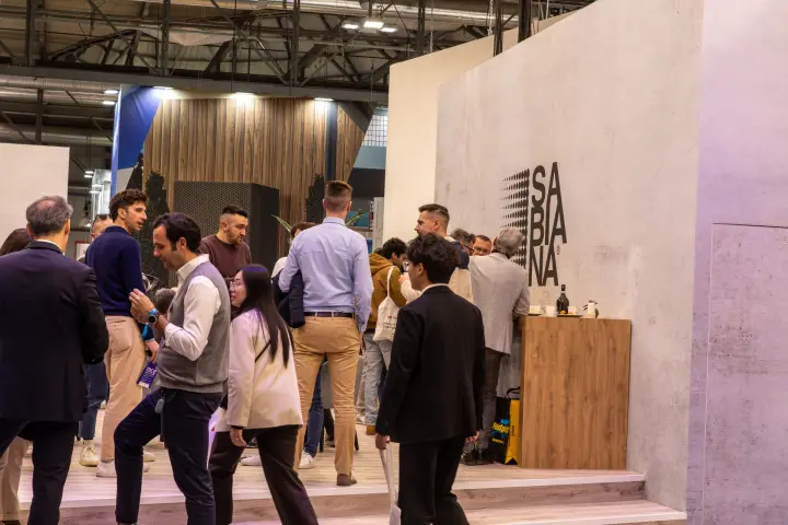 Sabiana hospitality bar with wooden counter and crowded entrance