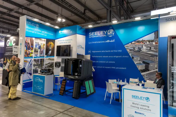 Seeley International stand with an opened evaporative cooler and its cooling pads
