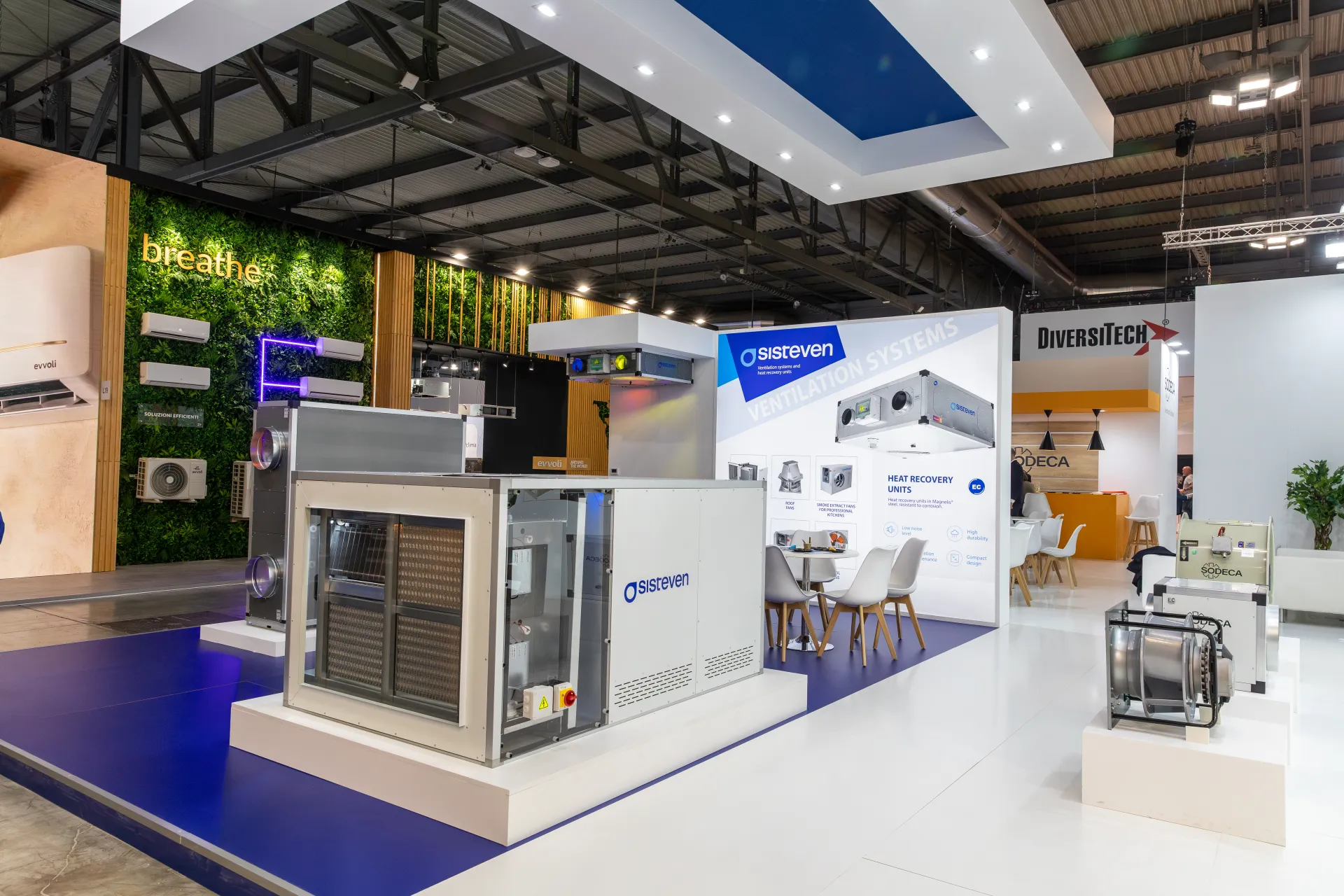 Sisteven ventilation unit on a white plinth beside Sodeca plug fans at MCE 2026