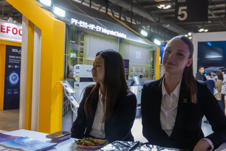 SolaX Power counter staff with the integrated solution display behind at MCE 2026
