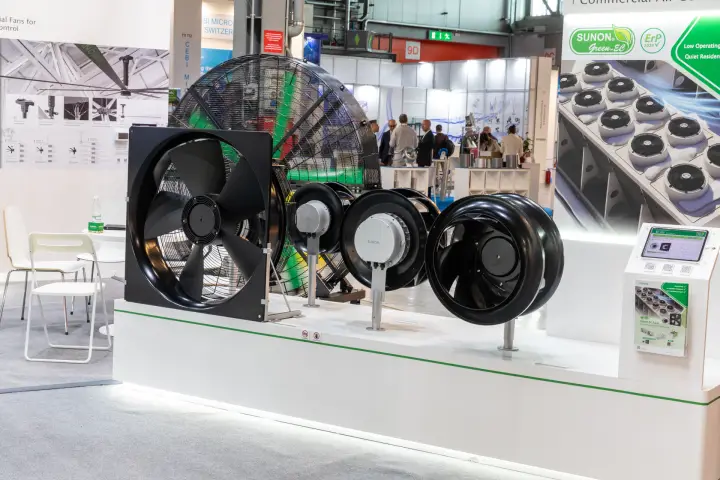 Sunon axial, drum and EC centrifugal fans lined up on a white plinth at MCE 2026