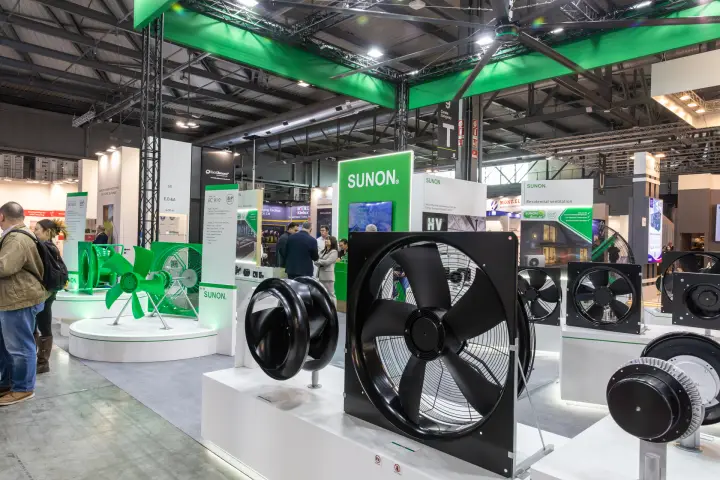 Sunon black axial and centrifugal fans in front of a green Sunon totem at MCE 2026