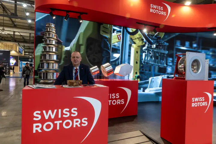 Swiss Rotors counter with impeller tower and plug fan before an LED wall
