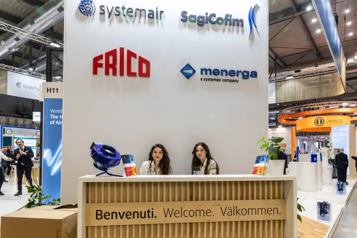 Systemair group reception with SagiCofim, Frico and Menerga logos and an inline duct fan at MCE 2026