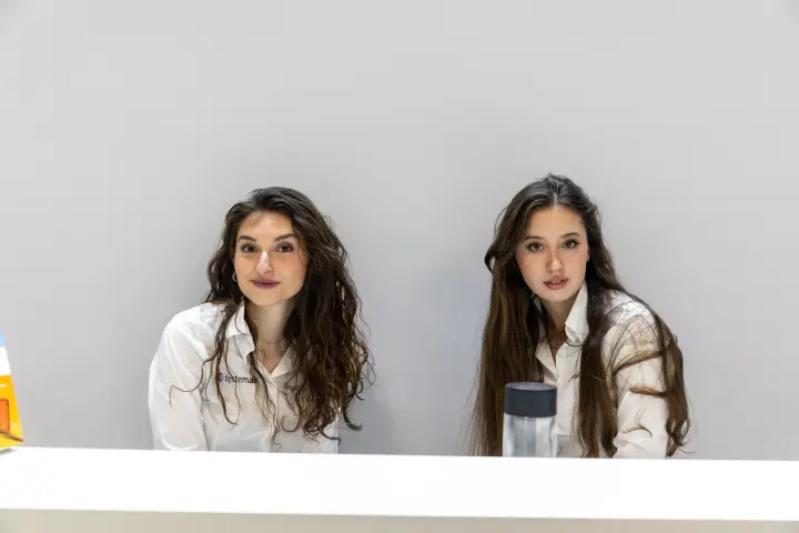 Systemair hostesses at the stand reception desk