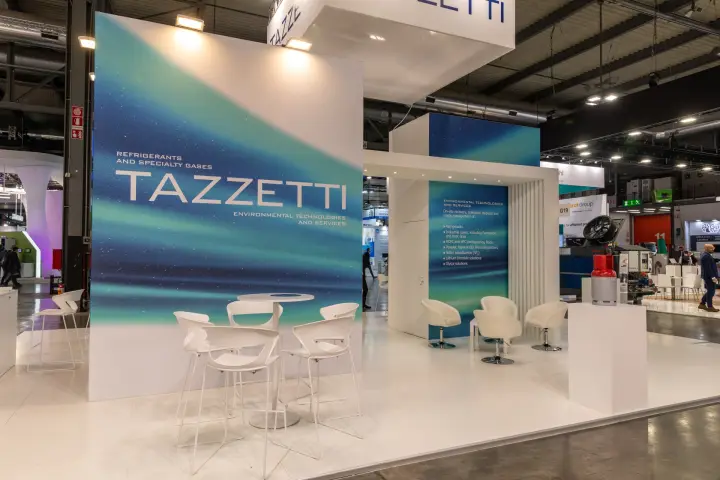 Tazzetti stand with aurora graphics and a refrigerant cylinder on a plinth at MCE 2026