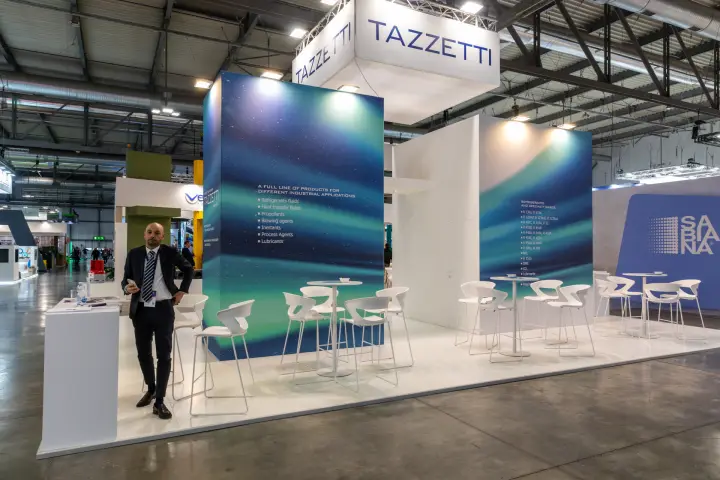 Tazzetti stand with aurora graphics and refrigerant product list at MCE 2026