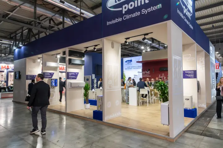 Tekno Point stand with NILO, IDEA and IMAGINE air conditioners and wine area at MCE 2026