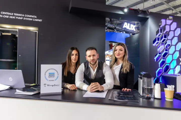 Templari reception counter beside the compact heat pump cabinet display at MCE 2026