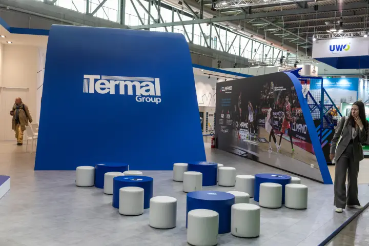Termal Group lounge with blue tables and white poufs at MCE 2026