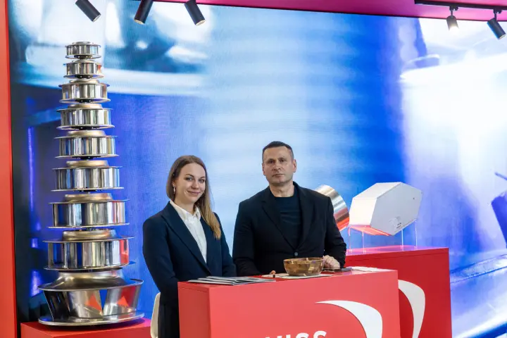 Tower of stacked centrifugal impellers beside the Swiss Rotors counter at MCE 2026