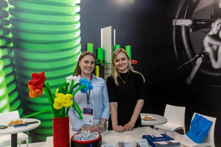 TT Plast staff with a bouquet made from flexible corrugated tubing
