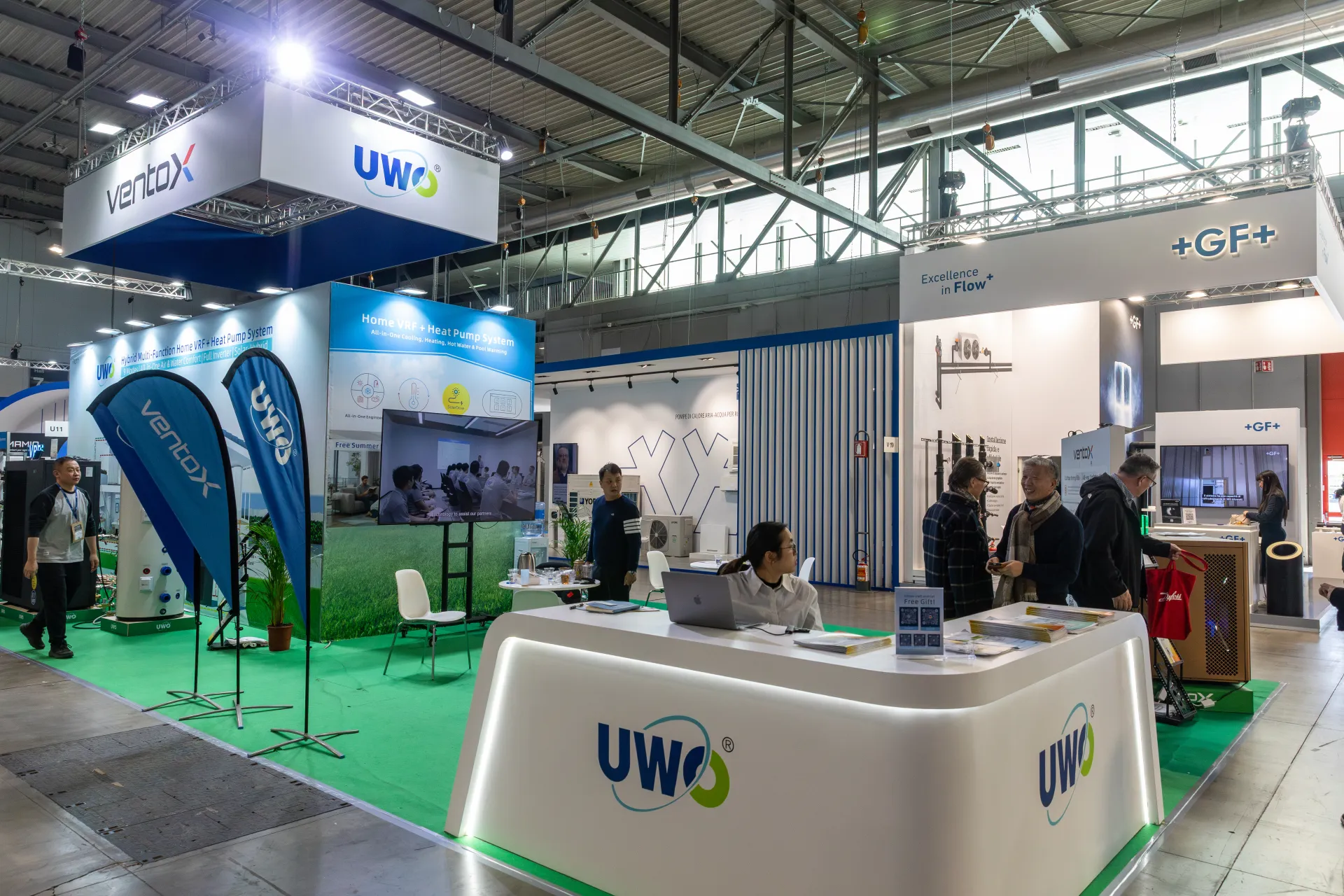 UWO and Ventox reception counter with Home VRF heat pump graphics at MCE 2026