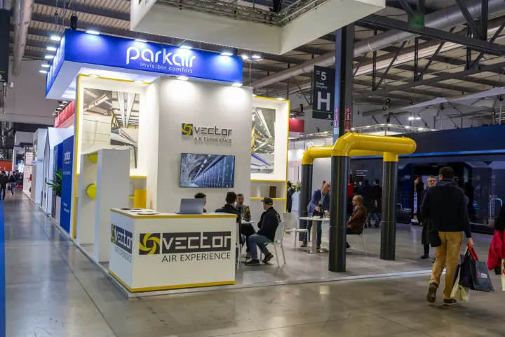 Vector Air Experience and Parkair stand with yellow duct sculpture at MCE 2026