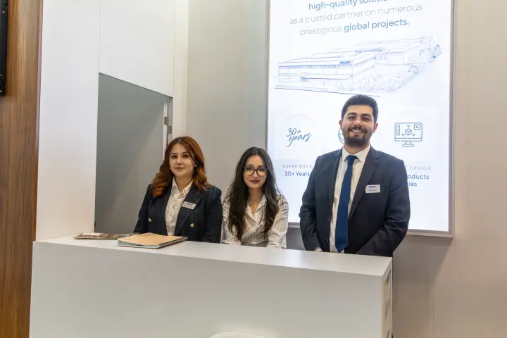 Venco reception counter with backlit 30+ years experience panel at MCE 2026