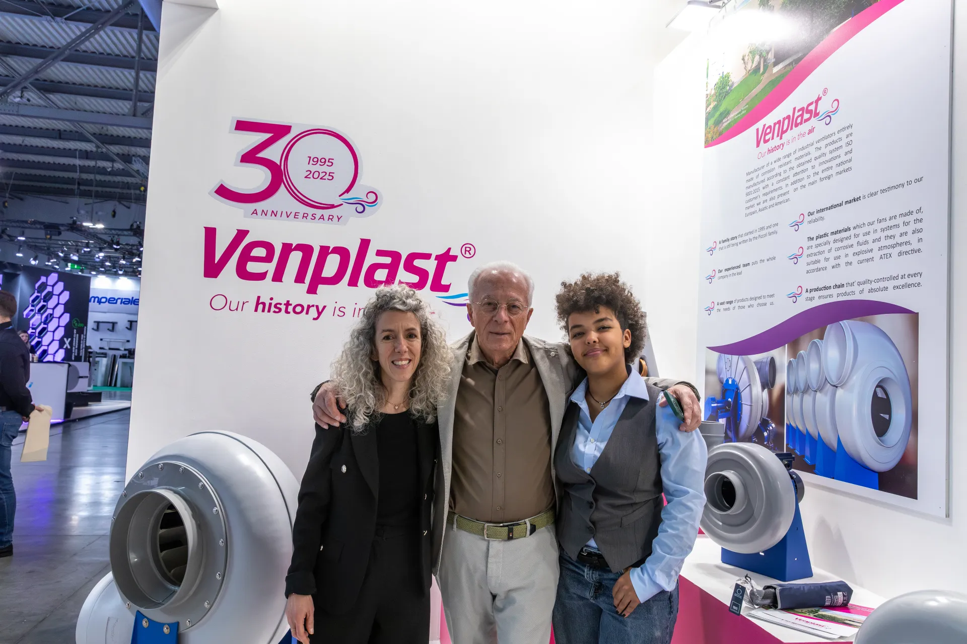 Venplast 30th anniversary wall with fans and company story panel at MCE 2026