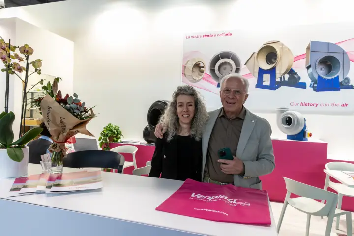 Venplast counter with branded bag, brochures and fan graphics at MCE 2026