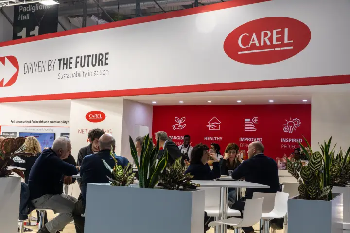 Visitors meeting under Carel's Driven by the Future fascia at MCE 2026