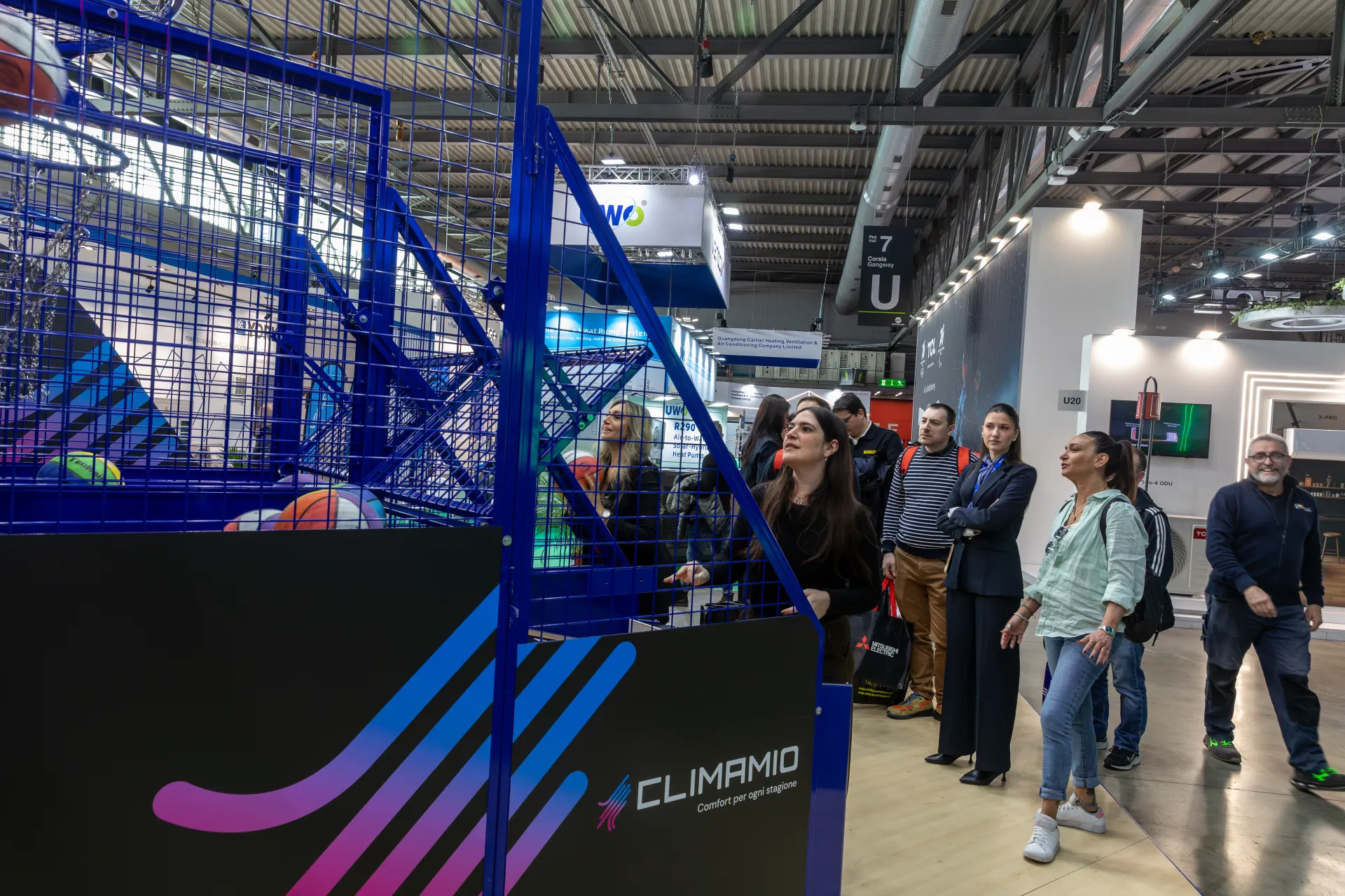 Visitors queue in the aisle to play the Climamio basketball game at MCE 2026