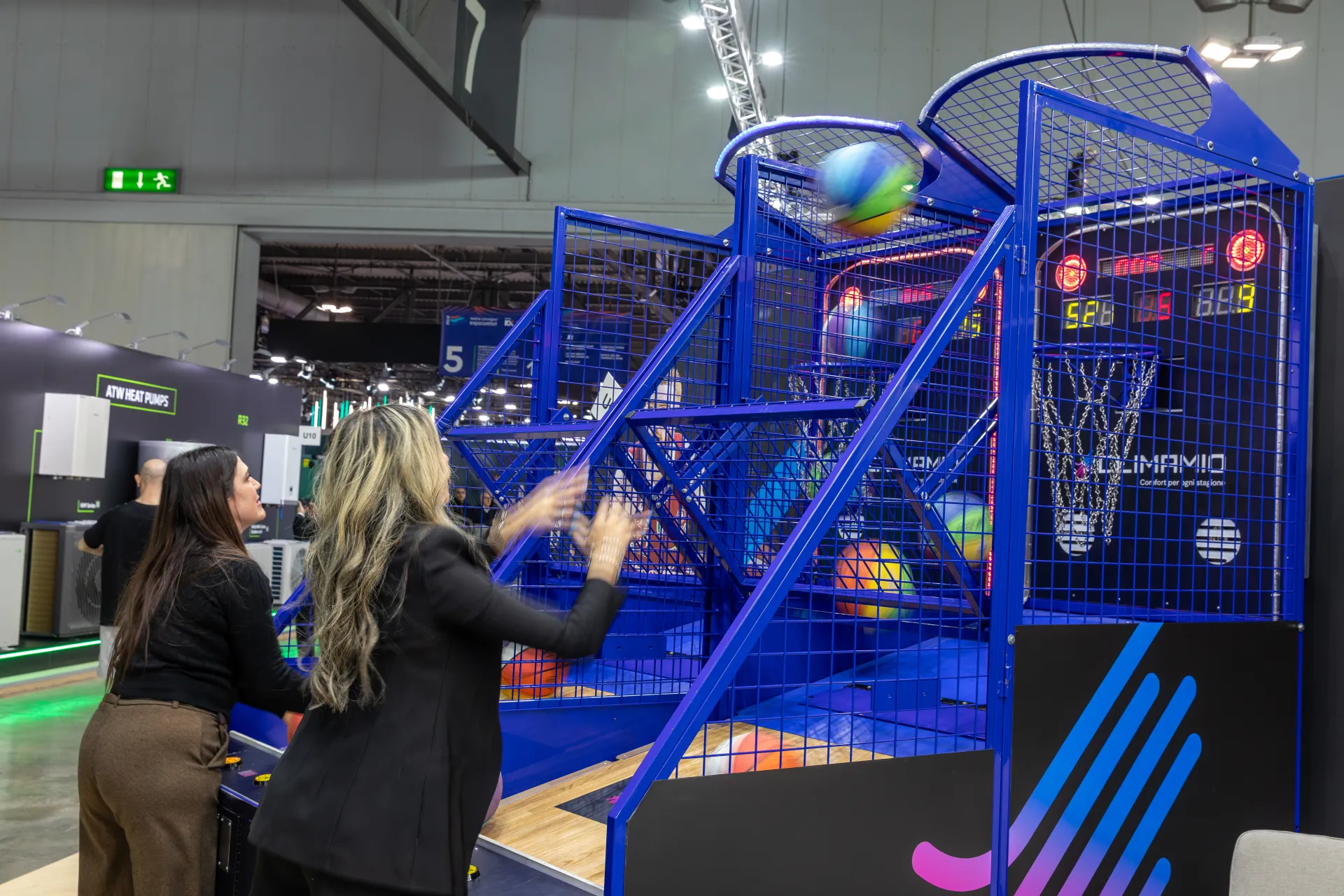 Visitors shooting hoops at the Climamio basketball arcade at MCE 2026