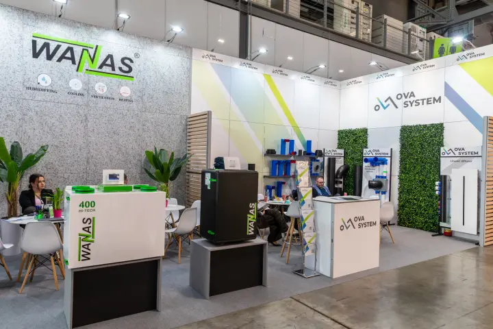 Wanas 400 Hi-Tech unit in front of the OVA System display wall at MCE 2026