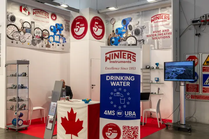 Winters Instruments stand with gauges, transmitters and a Canadian flag at MCE 2026