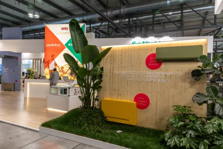 Wooden display wall with wall-mounted and floor fan coil units at MCE 2026