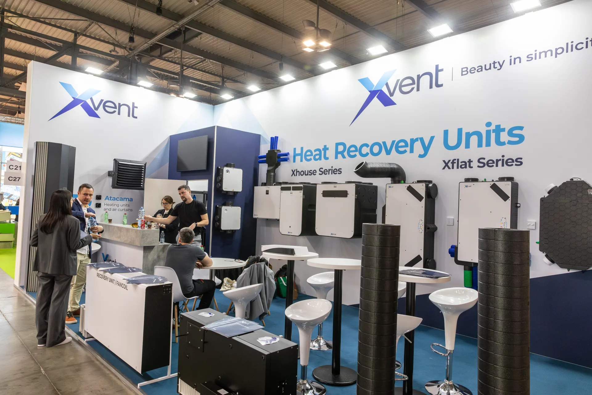 Xvent stand with Xhouse and Xflat heat recovery units on the wall at MCE 2026