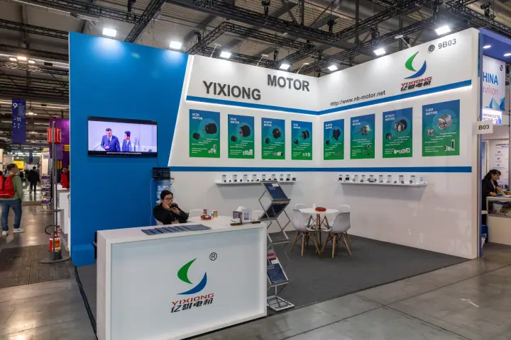 Yixiong Motor stand with EC and BLDC motor series posters at MCE 2026