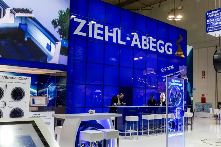 Ziehl-Abegg logo wall above bar counter with ErP 2026 message