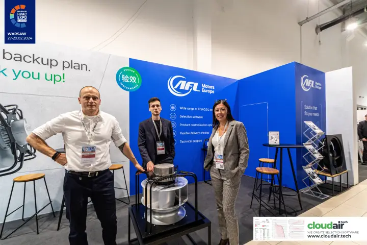 AFL Motors Europe team posing around a centrifugal fan display