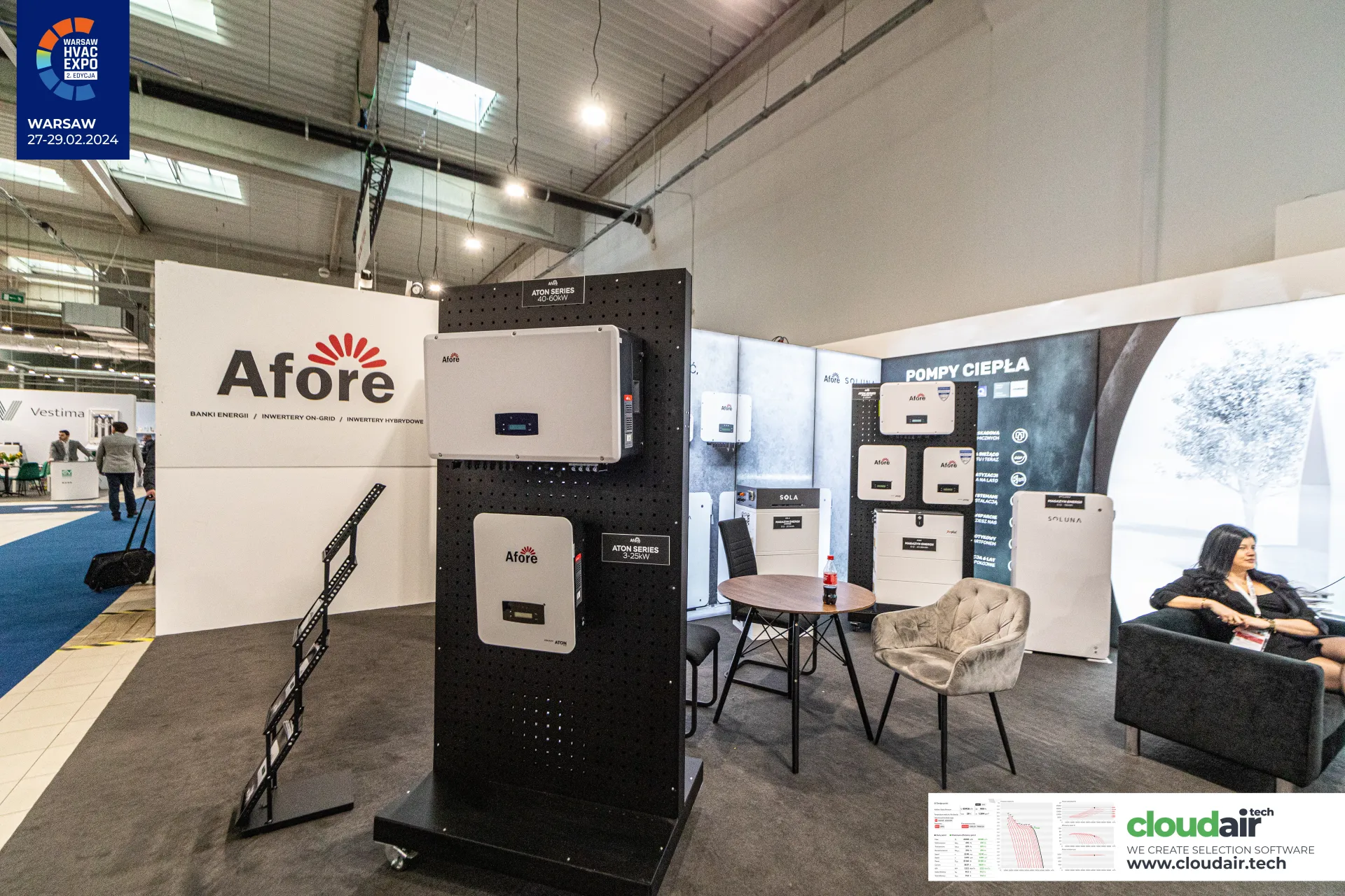 Afore stand with Aton Series inverters on a black pegboard display at Warsaw HVAC Expo 2024