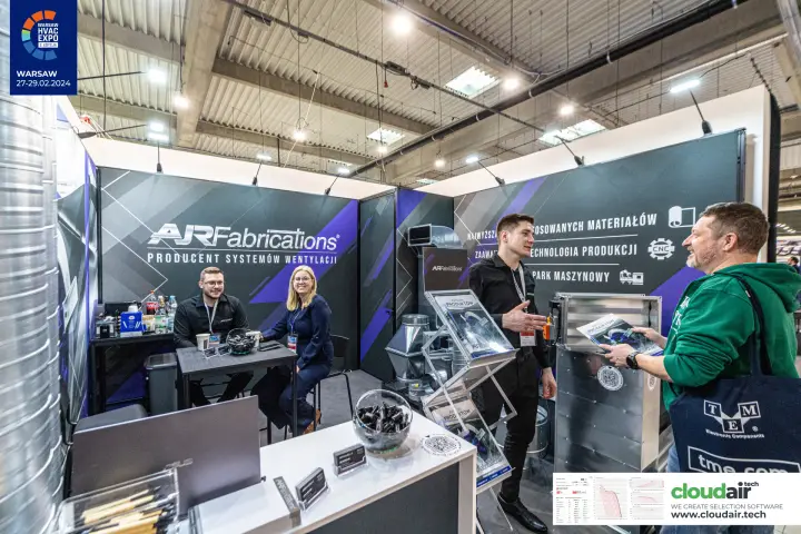 Air Fabrications stand with duct fittings, a damper and a catalogue rack