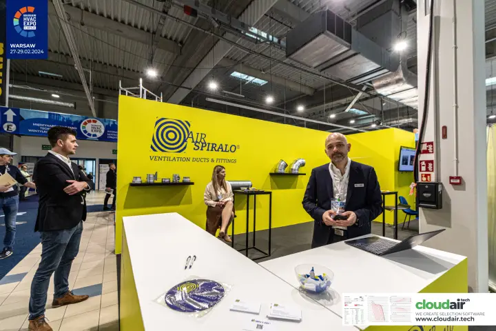 Air Spiralo yellow stand with the counter and duct fittings on shelves at Warsaw HVAC Expo 2024